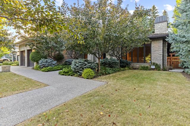 Front exterior and landscaped yard