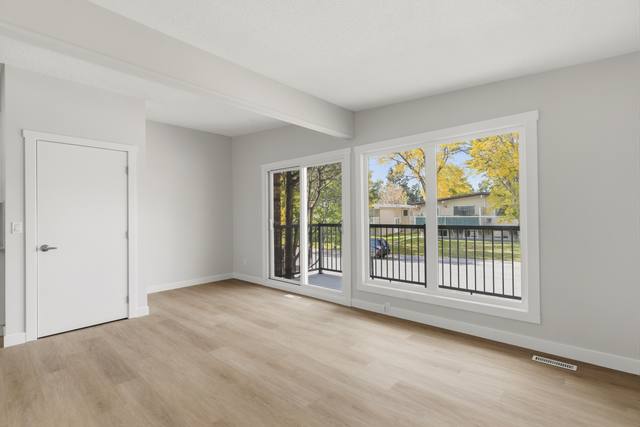 Living room with patio door to the deck