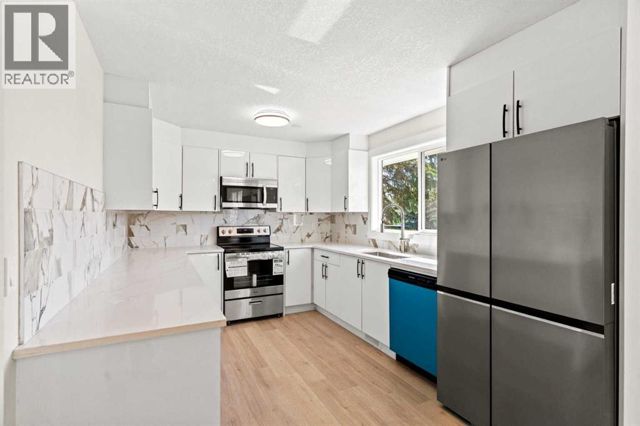 Kitchen with stainless steel appliances